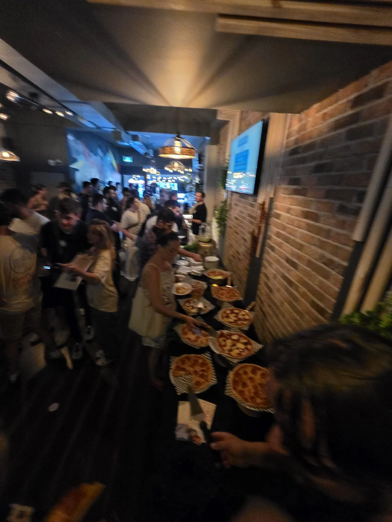 Guests at a catered event inside Kensington Socials
