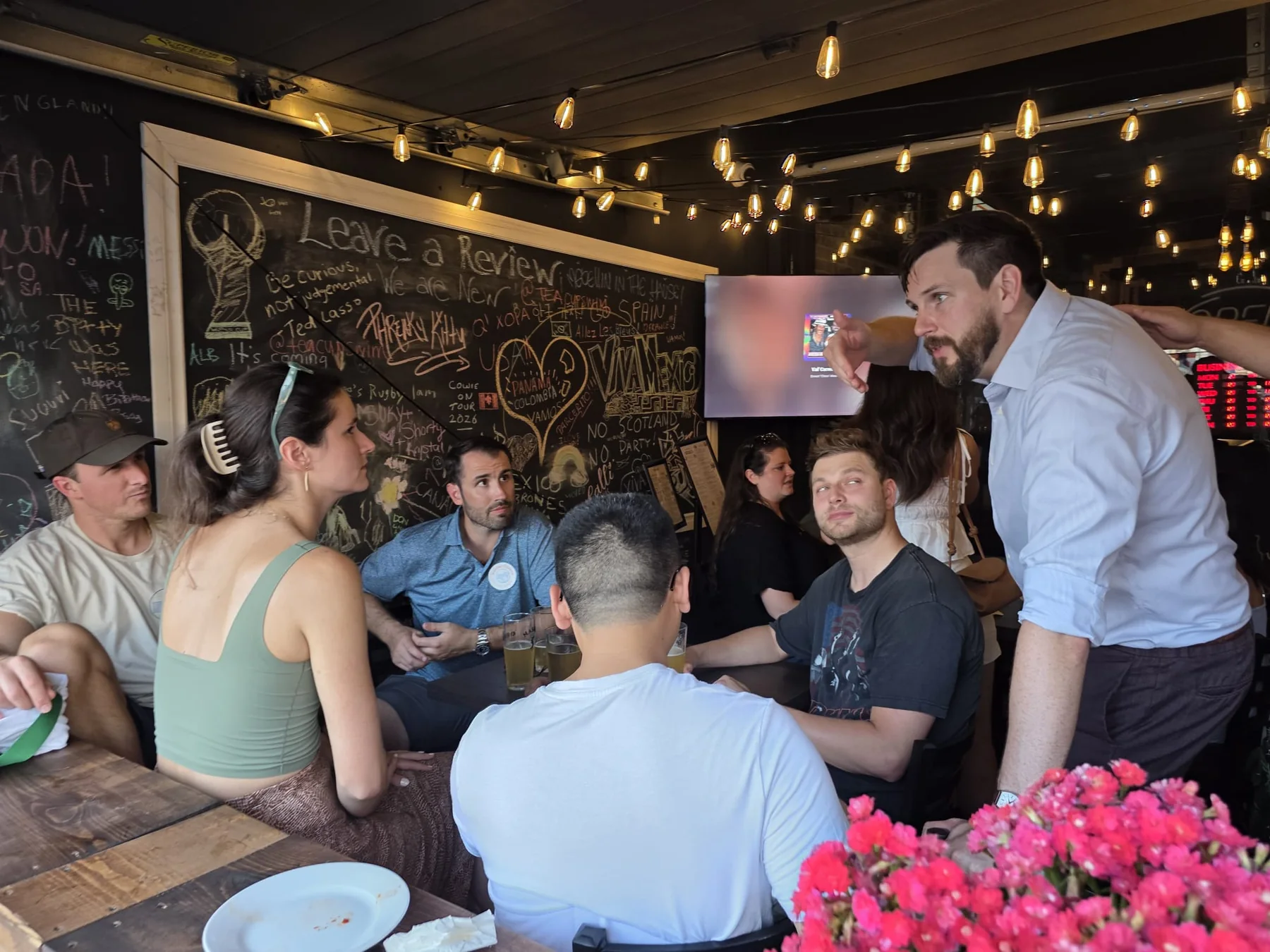 Friends enjoying a group gathering at Kensington Socials